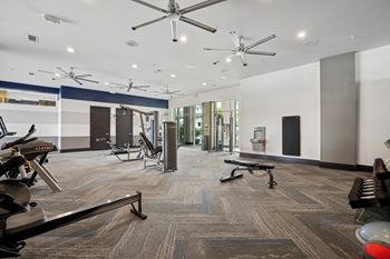 24-Hr fitness club with cardio equipment & free weights